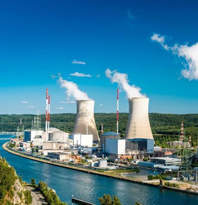 Large power plant beside a river